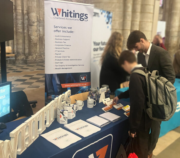 Joe Ftretwell on the Whitings LLP stand at the 2025 East Cambridgeshire Careers & Skills Fair